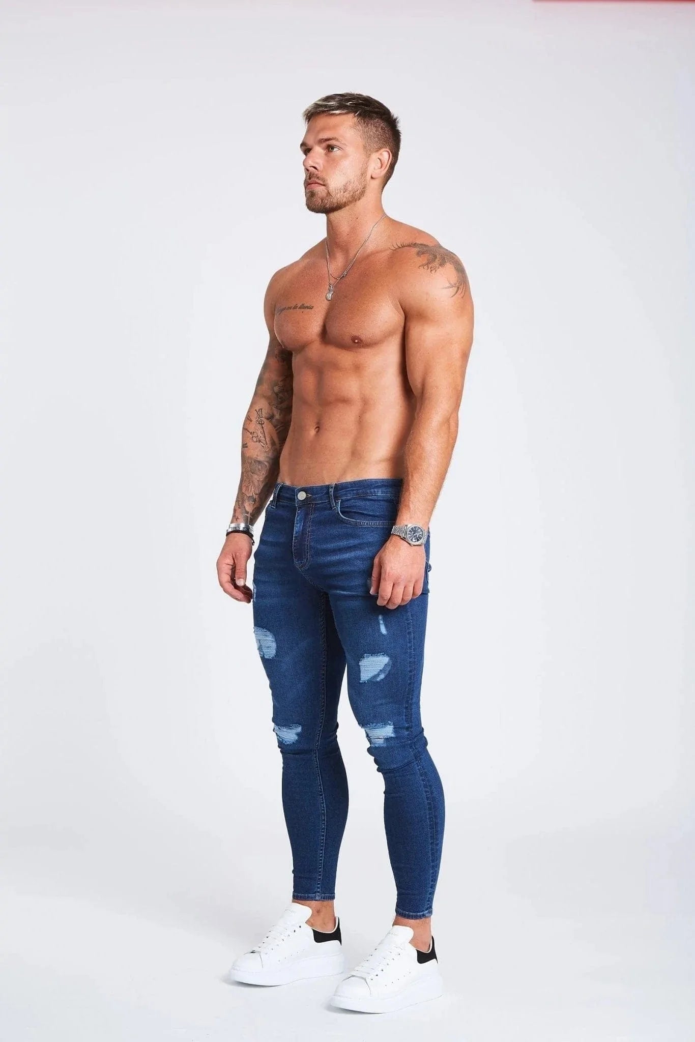 SKINNY FİT YIRTIK VE ONARILMIŞ JEAN - KOYU MAVİ