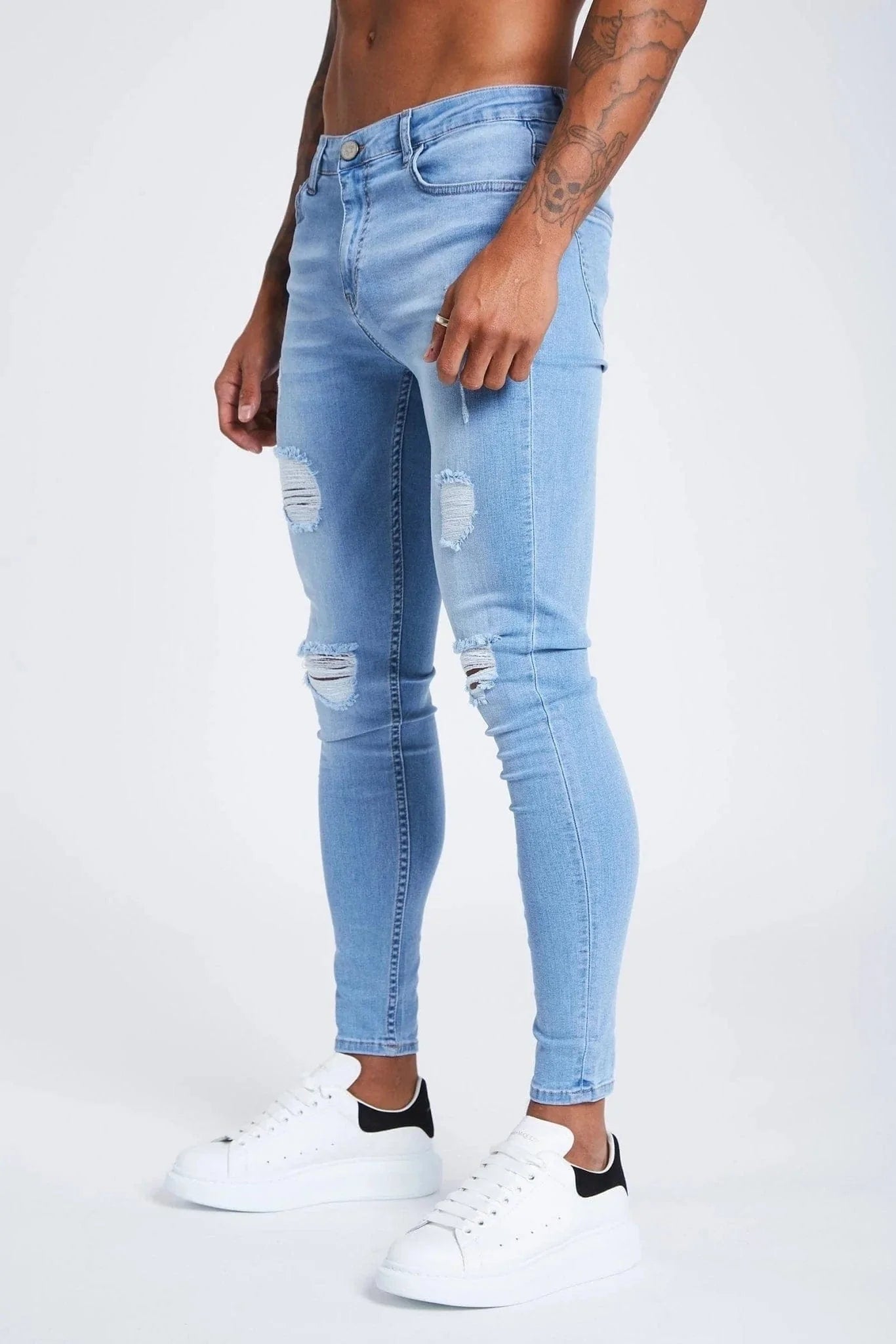 SKINNY FİT YIRTIK VE ONARILMIŞ JEAN - AÇIK MAVİ